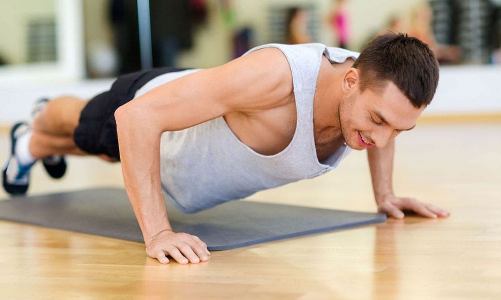 Flexiones de brazo en suelo