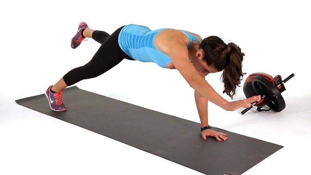 Plank con una mano y una pierna